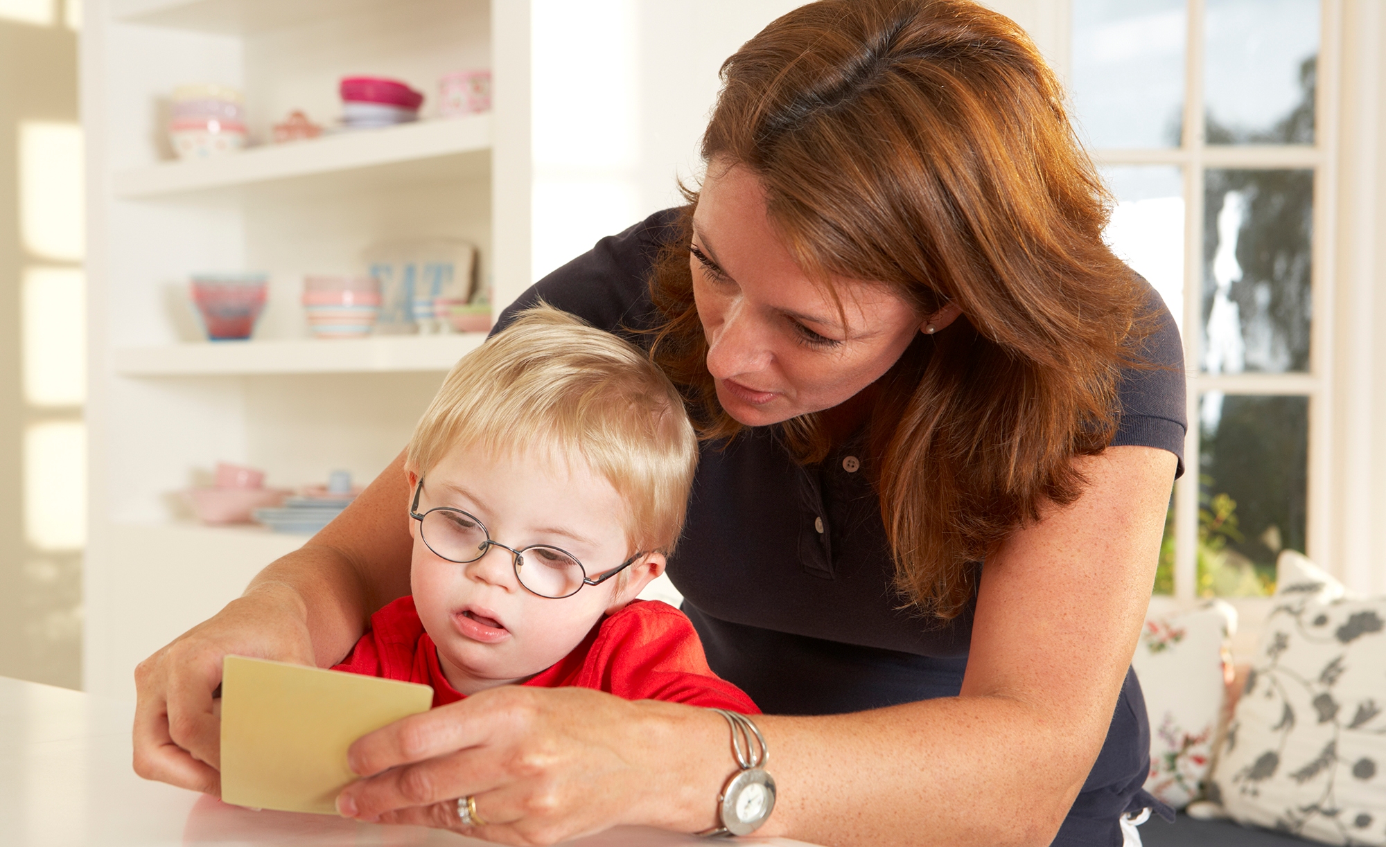 Downs Syndrome boyhaving speech therapy