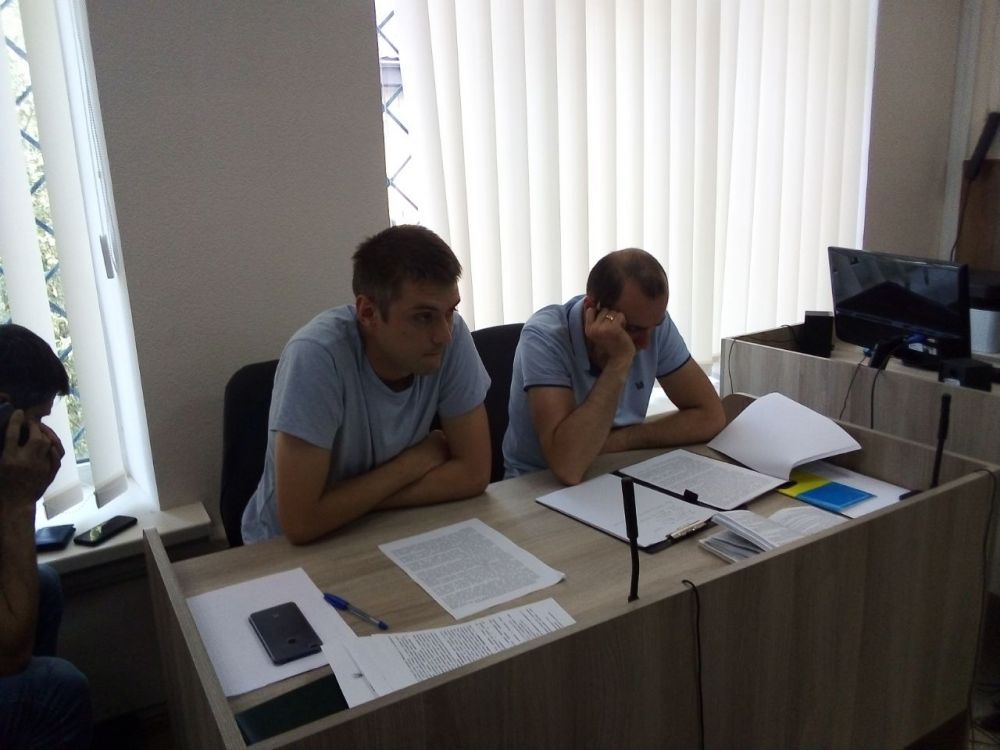 Слідчий Максим Зацеркляний та прокурор Віктор Крамаренко