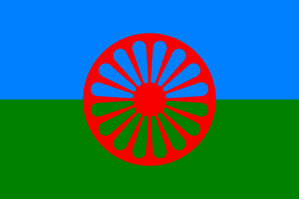 Національний прапор ромів. У центрі  - колесо, що символізує народ без історичної батьківщини. Джерело - corali.info